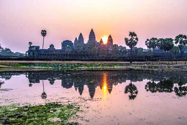 Sunrise over Angkor Wat temple complex in Cambodia