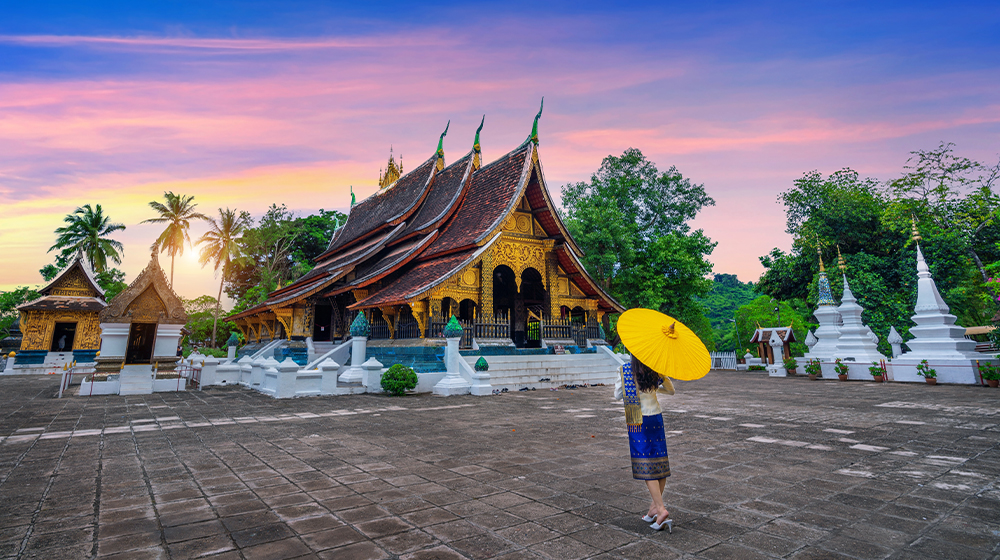 Luang Prabang charms with golden temples, tranquil riverside scenes, and French colonial heritage, offering a serene glimpse into Laos’s timeless spiritual heart.